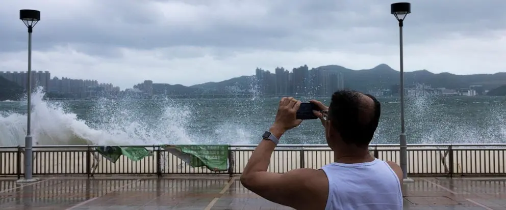 Hong Kong halts schools and stock market as typhoon Talim approaches 