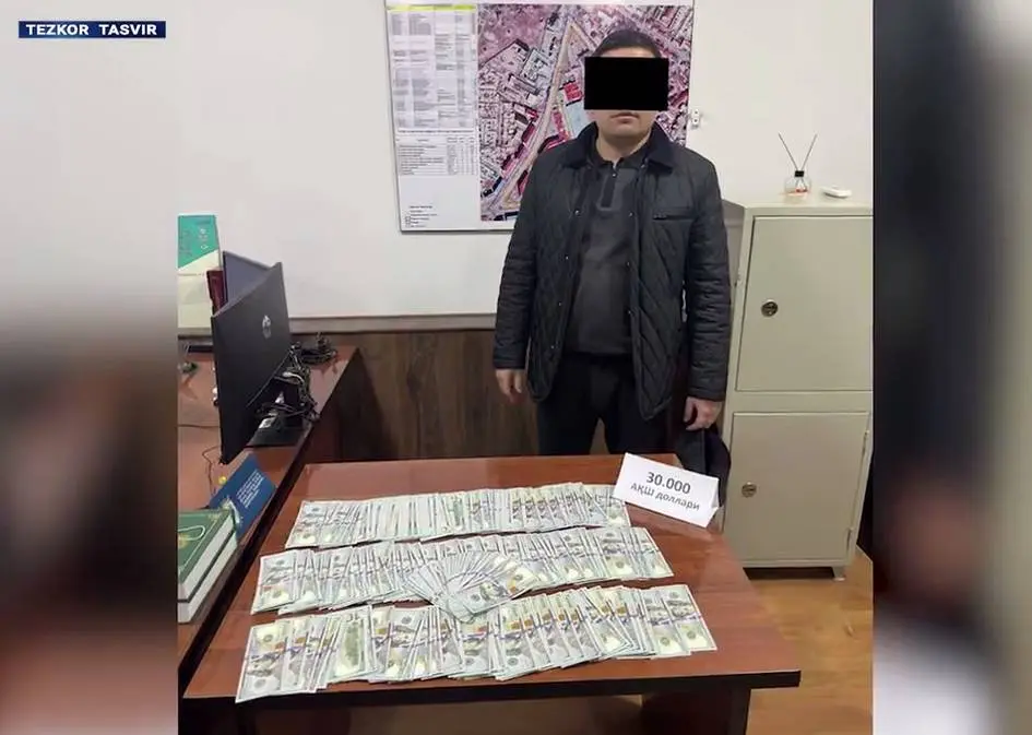 Xorazmda 30 ming dollar pora olgan IIB xodimi ushlandi