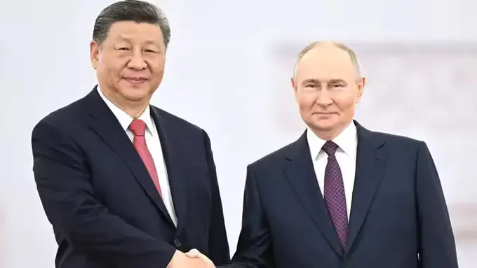 Си Цзиньпин Қозоғистонга қилган сафари ҳақида Путинга маълумот берди