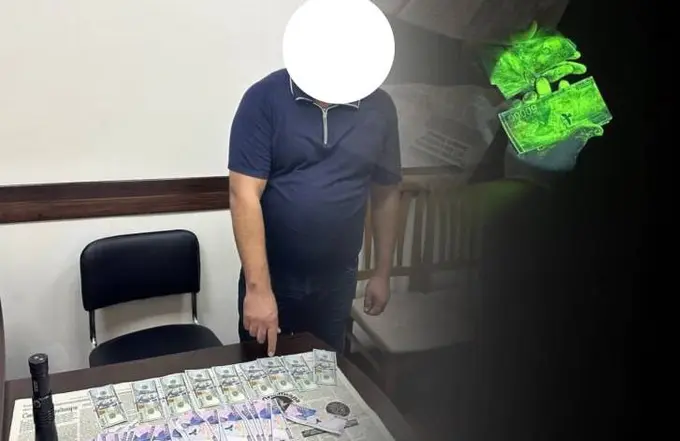 Surxondaryoda “snos”ga tushgan uy uchun kompensatsiya undirib berishni vaʼda qilgan shaxs ushlandi