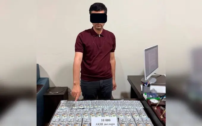 Farg‘ona bank xizmatlari markazi rahbari 10 ming dollar pora bilan ushlandi